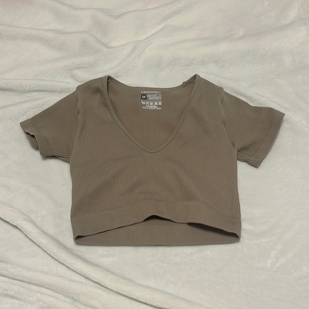 Pretty little thing never worn size medium work out top